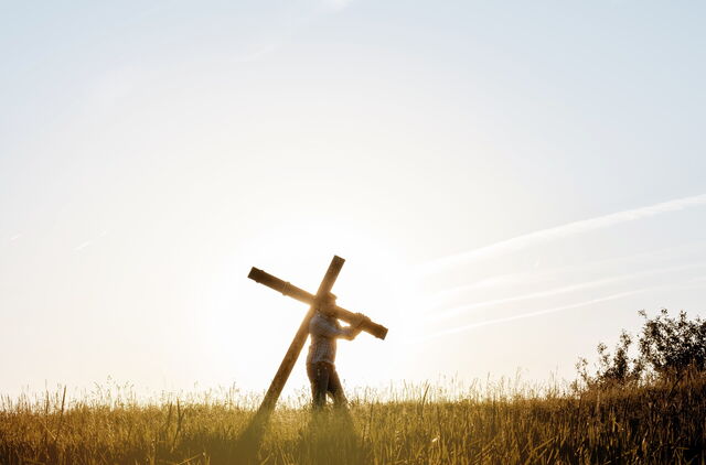 Carrying the crucifix