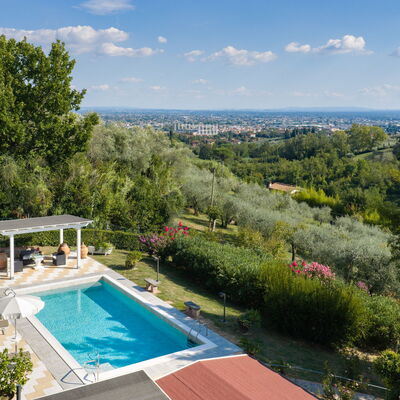 Al Melo: Building Exterior, Garden, Pool, Scenic View, Summer
